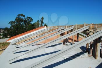 Royalty Free Photo of Framework of a House Roof Under Construction