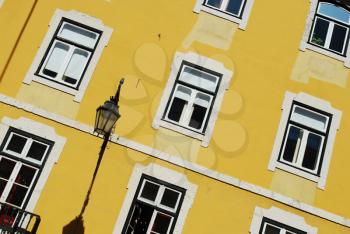 Royalty Free Photo of a Yellow Residential Building
