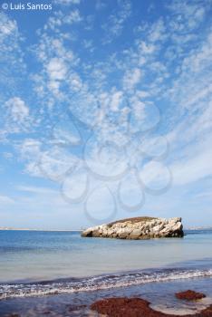 Royalty Free Photo of a Huge Rock in Baleal Peniche Beach, Portugal