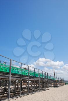 Royalty Free Photo of Green Stadium Bleachers on the Beach