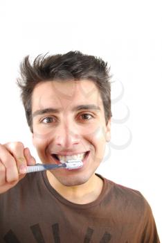 Royalty Free Photo of a Man Brushing His Teeth