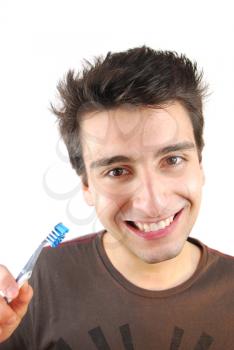 Royalty Free Photo of a Man Holding a Toothbrush