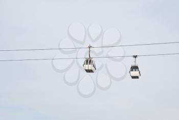 Royalty Free Photo of Two Modern Cable-cars in Nations Park in Lisbon, Portugal