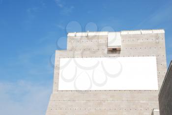 Royalty Free Photo of a Billboard on a Building