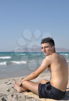 Royalty Free Photo of a Man at Kos Beach in Greece 