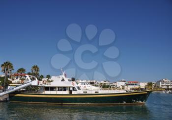 Royalty Free Photo of an Antique Yacht at Kos Harbour, Greece