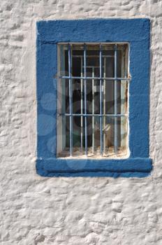 Royalty Free Photo of a Blue Window in Greece