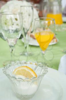 Royalty Free Photo of Lemon Ice Cream at a Table