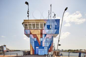 a very colorful and tall bridge tower in denmark