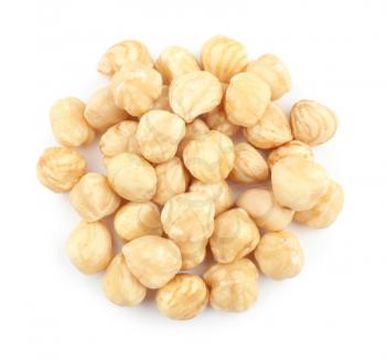 Peeled hazelnuts on white background�