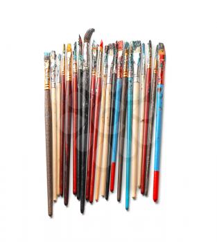 Dirty paint brushes on white background�