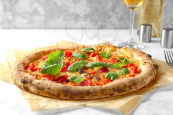 Delicious pizza on table�