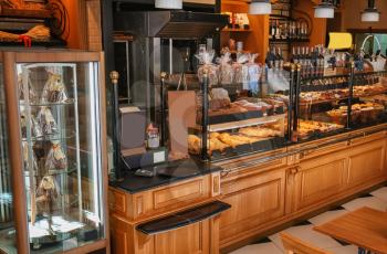 Interior of shop with fresh bakery on counter�