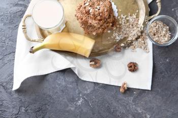 Composition with delicious oatmeal cookies on textured background�