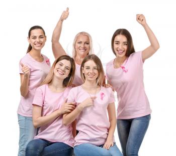 Beautiful women of different ages with pink ribbons on white background. Breast cancer concept�