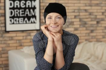 Happy woman after chemotherapy at home�