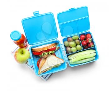 Lunch boxes with appetizing food and notebook on white background�