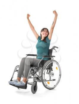 Happy young woman in wheelchair on white background�