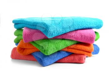 Stack of clean soft towels on white background�