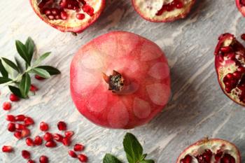 Ripe pomegranates on light background�