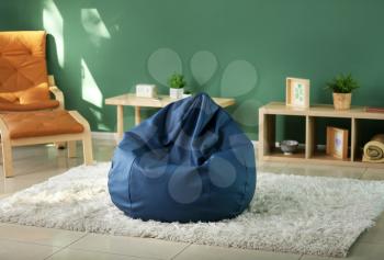 Beanbag chair in interior of room�