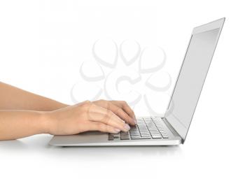 Woman using laptop on white background�