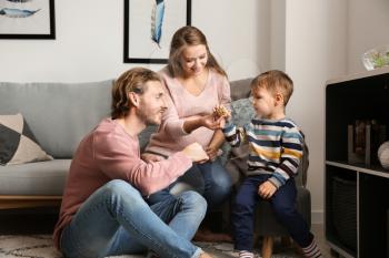 Happy family spending time at home�