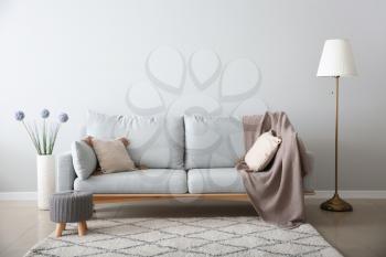 Soft sofa in interior of living room�