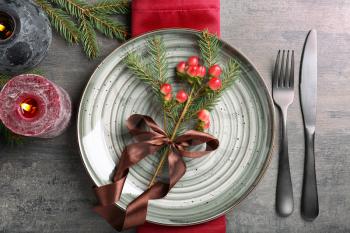 Beautiful Christmas table setting on wooden background�