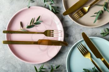 Simple table setting on grey background�