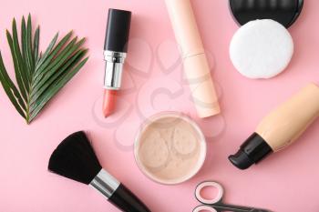 Set of cosmetics with accessories on color background�