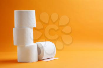 Rolls of toilet paper on color background�