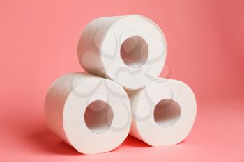 Rolls of toilet paper on color background�
