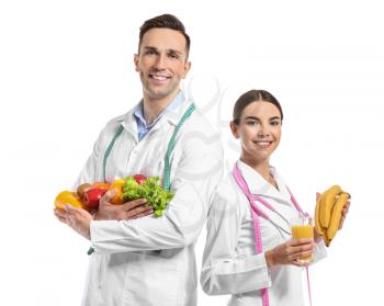 Portrait of nutritionists on white background�