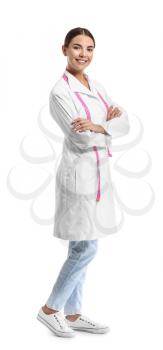 Portrait of female doctor on white background�