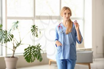 Female medical assistant in clinic�