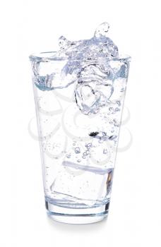 Glass of fresh water with splash on white background�