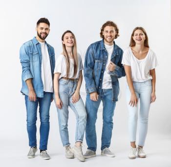 Stylish young people in jeans clothes on white background�