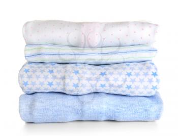 Stack of baby clothes on white background�