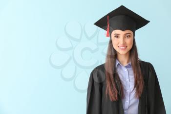 Female graduate on color background�