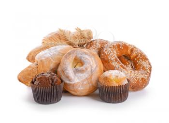 Heap of tasty pastries on white background�