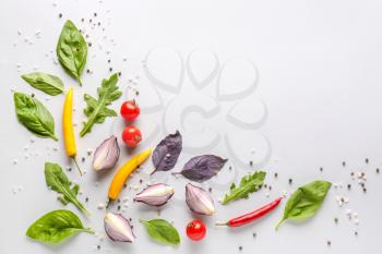 Fresh herbs with vegetables and spices on white background�