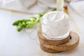 Jar of natural cream on light background�
