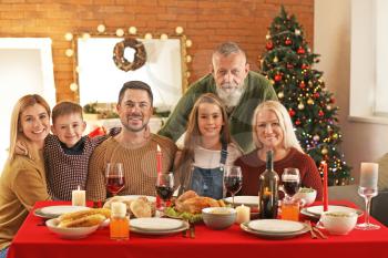 Happy family celebrating Christmas at home�