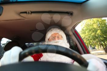 Santa Claus driving modern car�