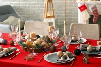 Festive table setting for Christmas dinner at home�