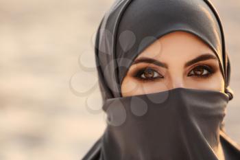 Portrait of beautiful Muslim woman outdoors, closeup�