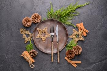 Beautiful table setting for Christmas dinner on dark background�