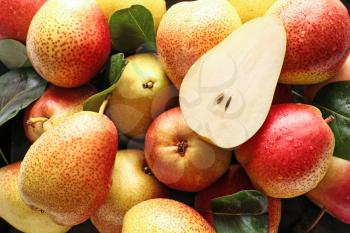 Many sweet ripe pears as background�