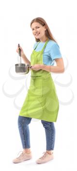 Beautiful young woman with kitchenware on white background�